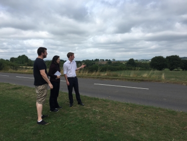 Cllr Alex Dale (left), with Cllr Angelique Foster and Lee Rowley MP close to green belt fields at Eckington Road, Coal Aston, where 200 new houses have been proposed by the District Council