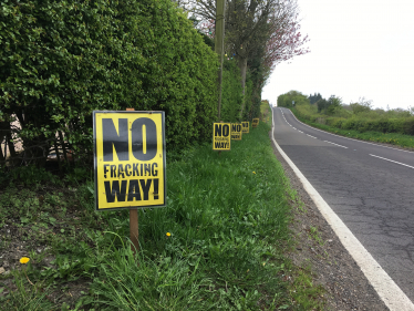 No fracking way signs